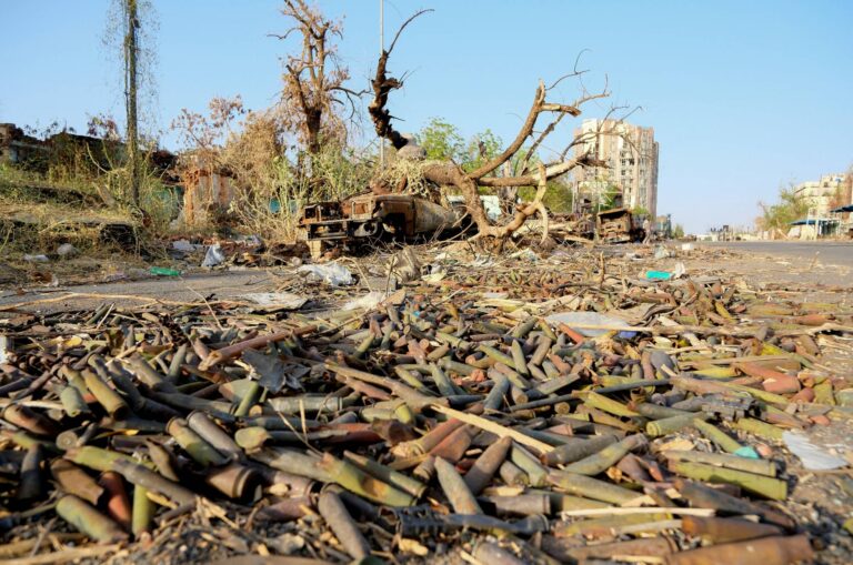 Unexploded ordnance lie on the ground on a street in Khartoum