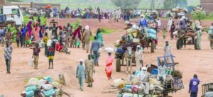 FILE PHOTO: People fleeing the violence in West Darfur