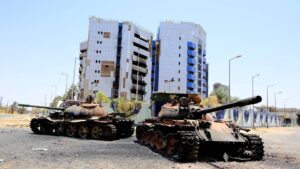 FILE PHOTO: A view of damaged tanks in front of the Central Bank of Sudan building, in Khartoum